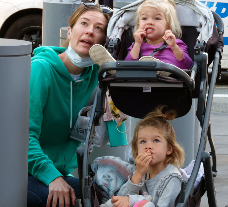 These three were among many who watched the rescue from down below on Vesey Street. Photo: Carl Glassman/Tribeca Trib
